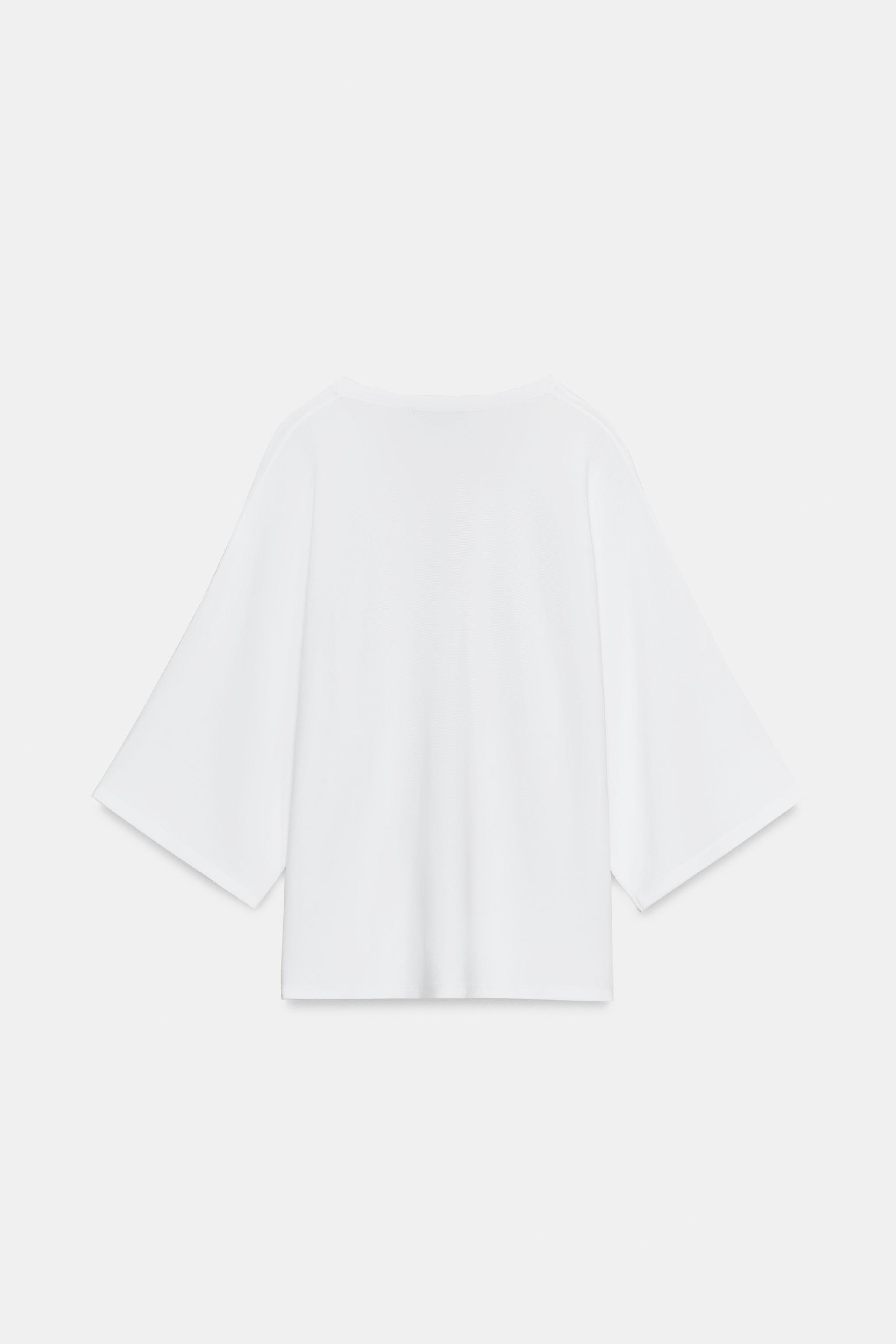 PULL EN MAILLE FLUIDE À COL V